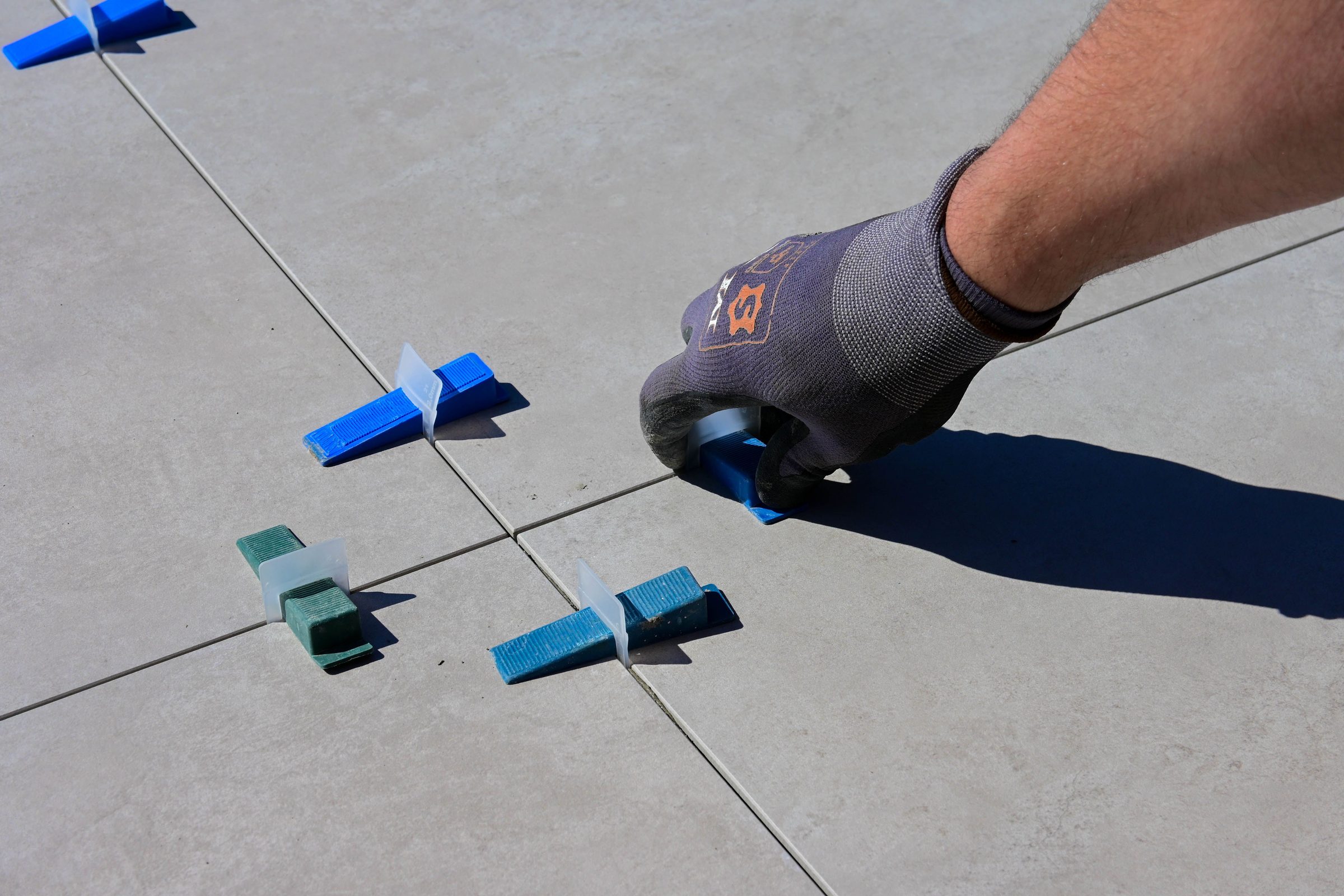 Close-up of precision tile levelling